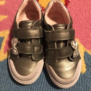 Silver sneakers with bows